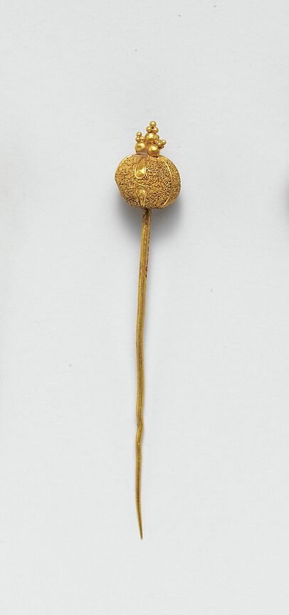 Etruscan gold pin with round ornamented head